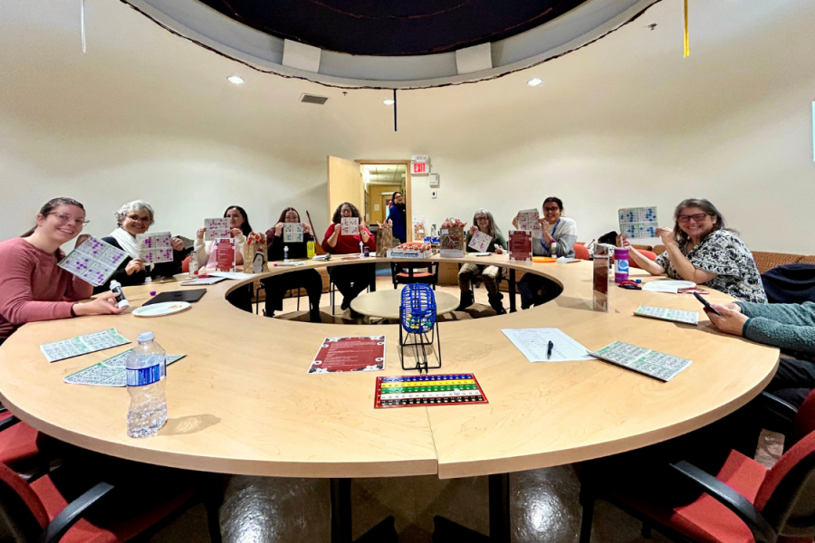 Participants seated around a table during a group workshop.