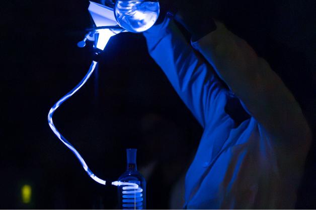 Man holding light experiment