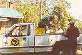 Honey Care collecting full suppers from farmers - Kakamega (Jan. 2004)