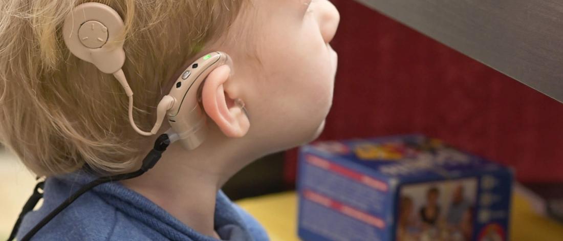 Child with a cochlear implant.