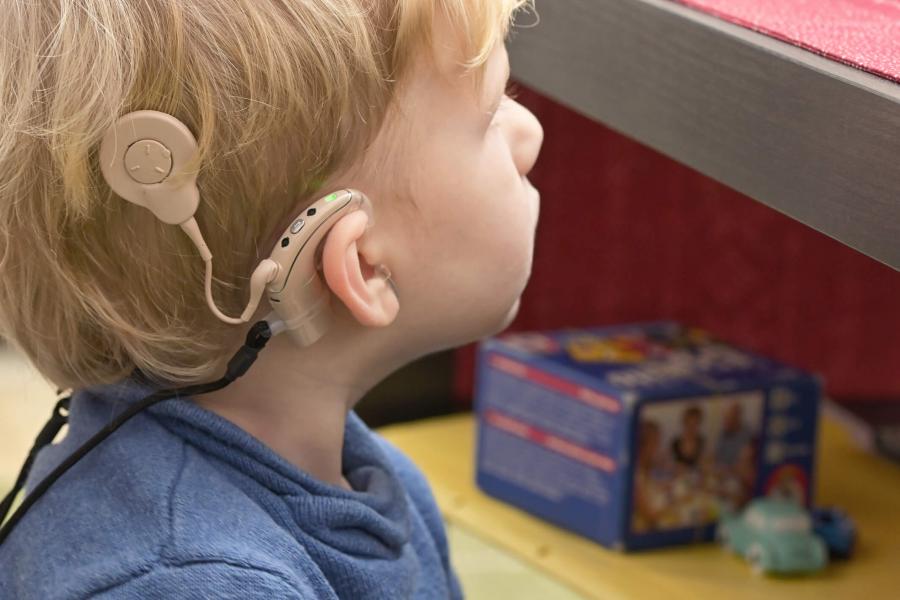Child with a cochlear implant.
