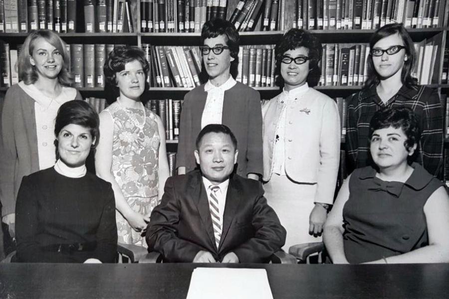 Library Staff 1969-1970: Sitting (left to right): Carol Sharp, Mr. S. Hu, Reta Craven; Standing (left to right): Jennifer Bradford, Linda Toxopeus, Margaret Hay, Joy Chen, Bonnie Gee ; Missing: Judy Head