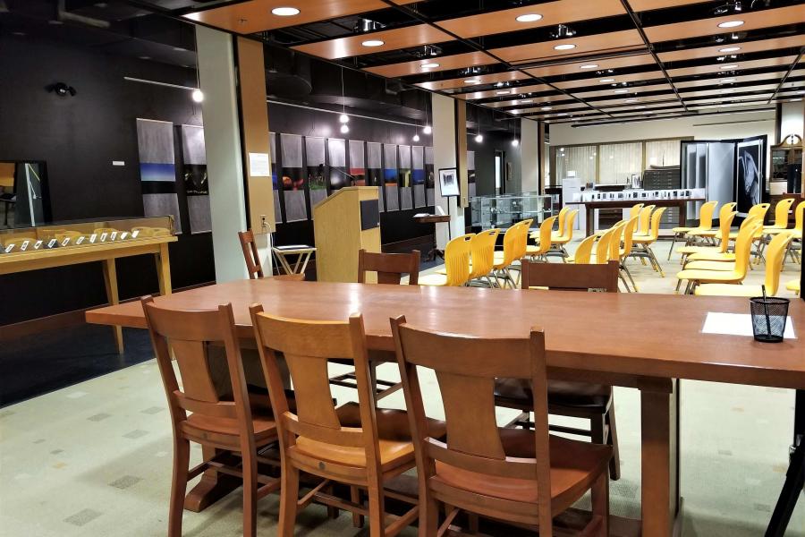 Room set up with tables and chairs in the UM Archives