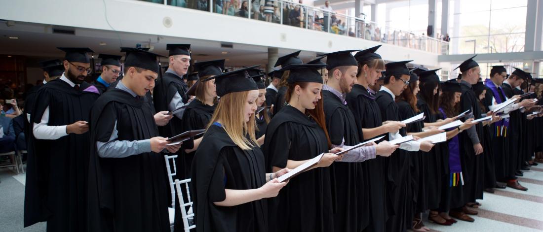 Students at convocation in dress robes