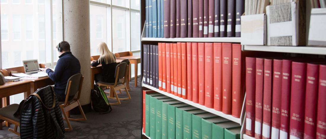 Students studying in a library.