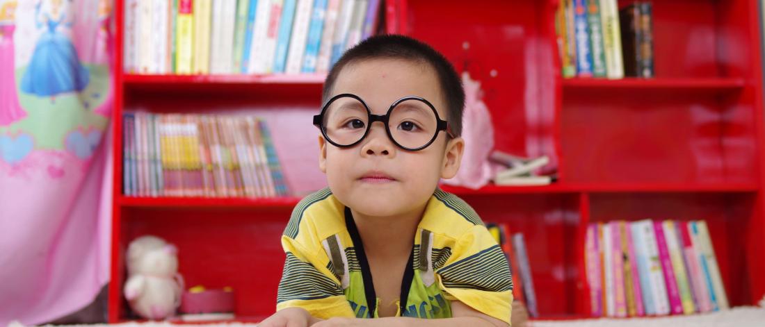 Child with glasses.