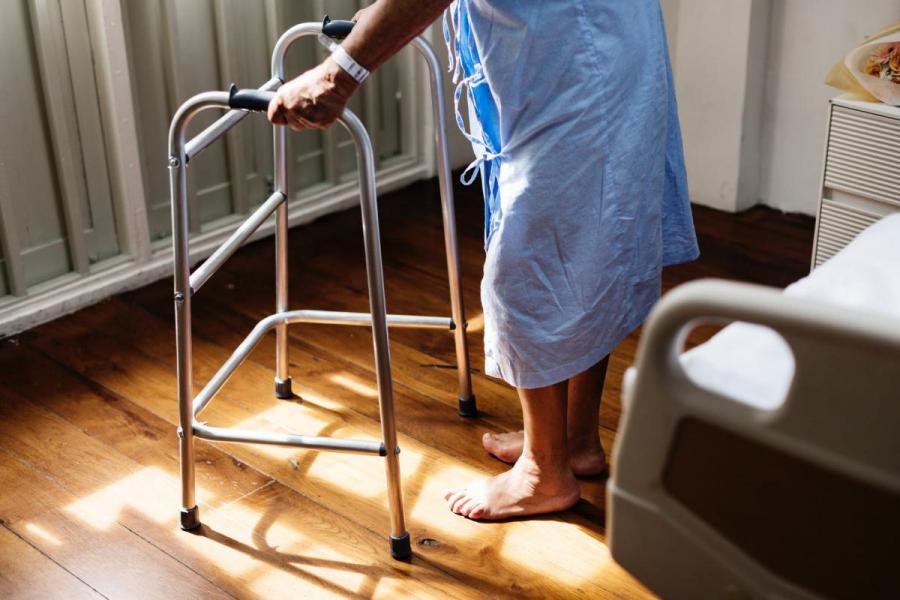 patient using a walker.