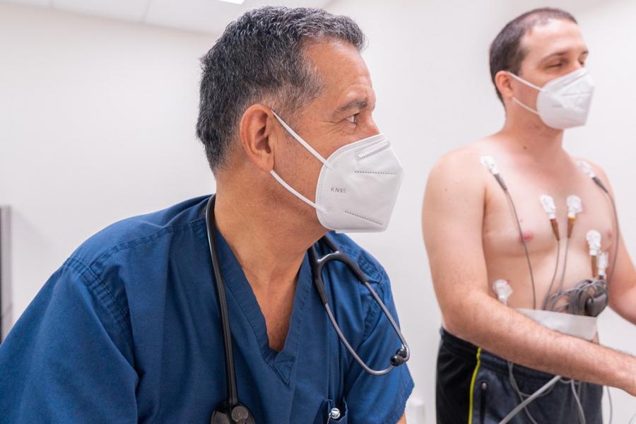 Physician performs a stress test.