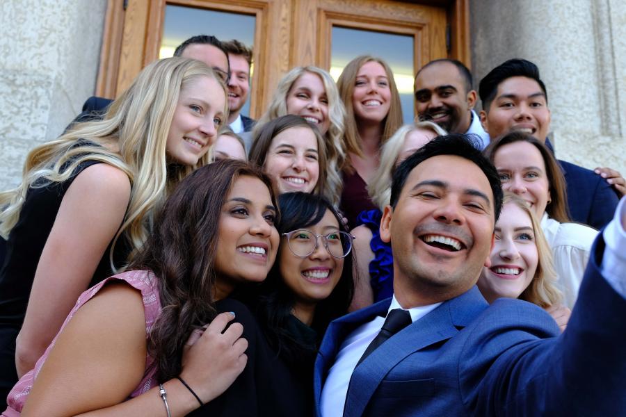 Students pose for a large group selfie