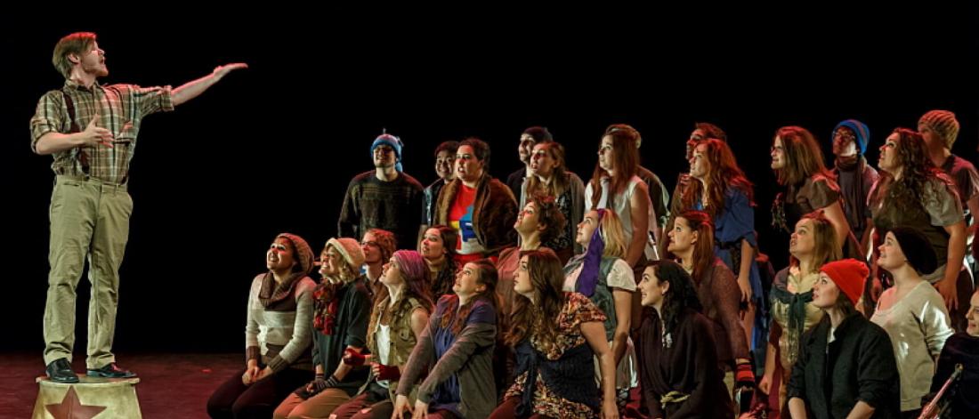 A musical theatre ensemble performance.
