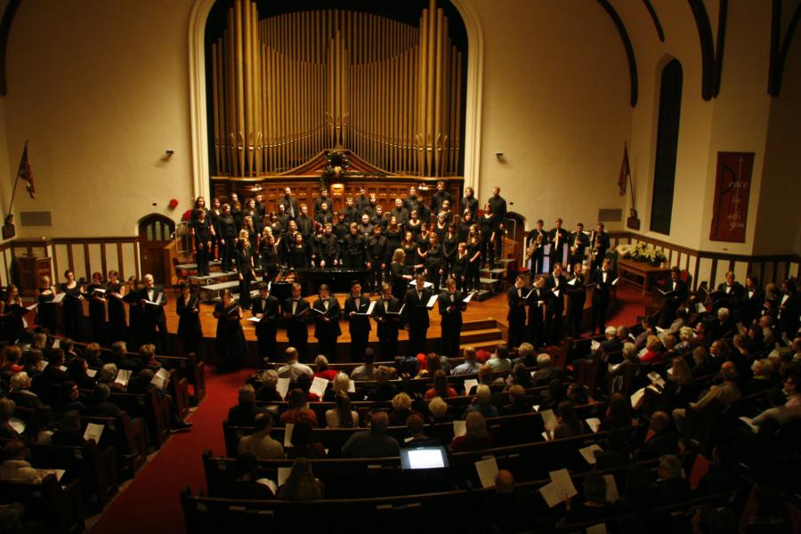 A concert choir ensemble performing. 