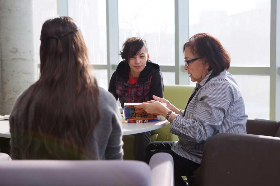 Students studying with Elder-In-Residence Margaret Lavallee.