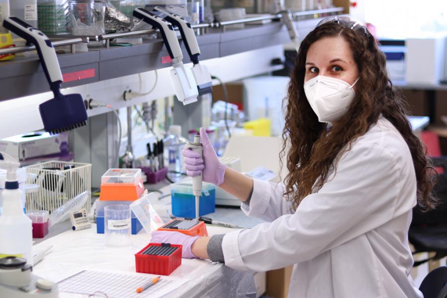 Photo of Courteny Lawrence in a lab.