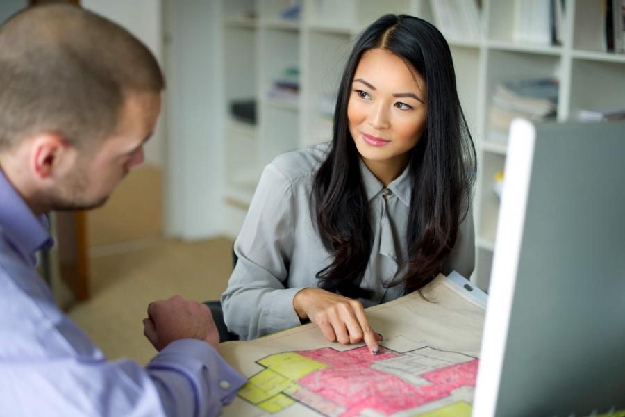 Therapist reviewing a site survey with a patient.
