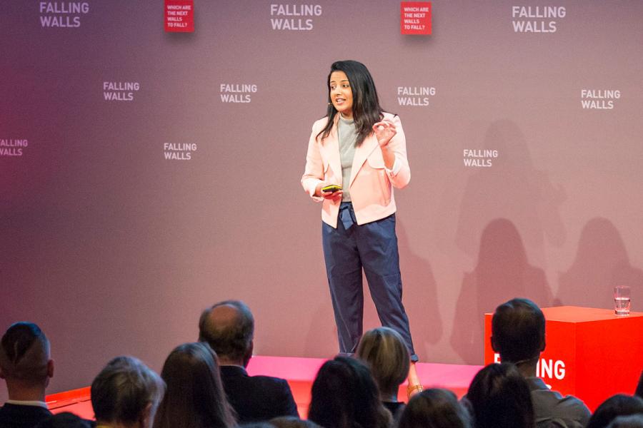 A woman presenting to an audience at Falling Walls Lab