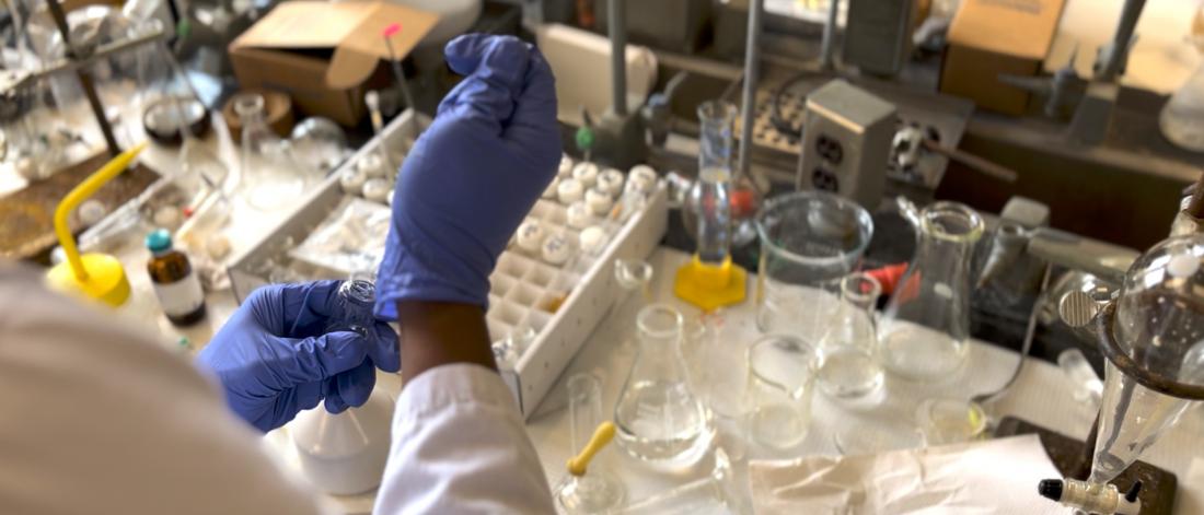 A student doing a lab experiment.