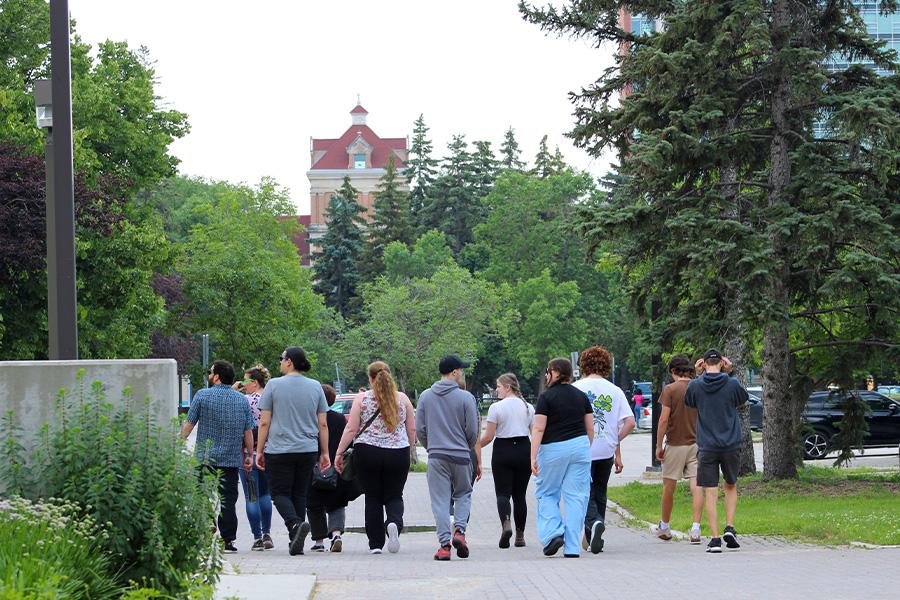 Photo of Wawatay students walking around the campus during the 2024 orientation.