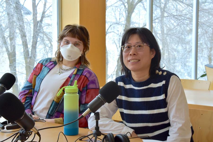 Elayna Paddock Thiessen and Xinli Wang smiling at the camera.