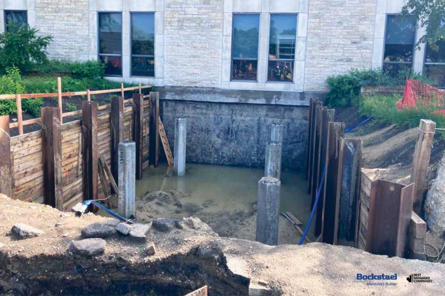 Standing water in excavation at parker foundation wall.