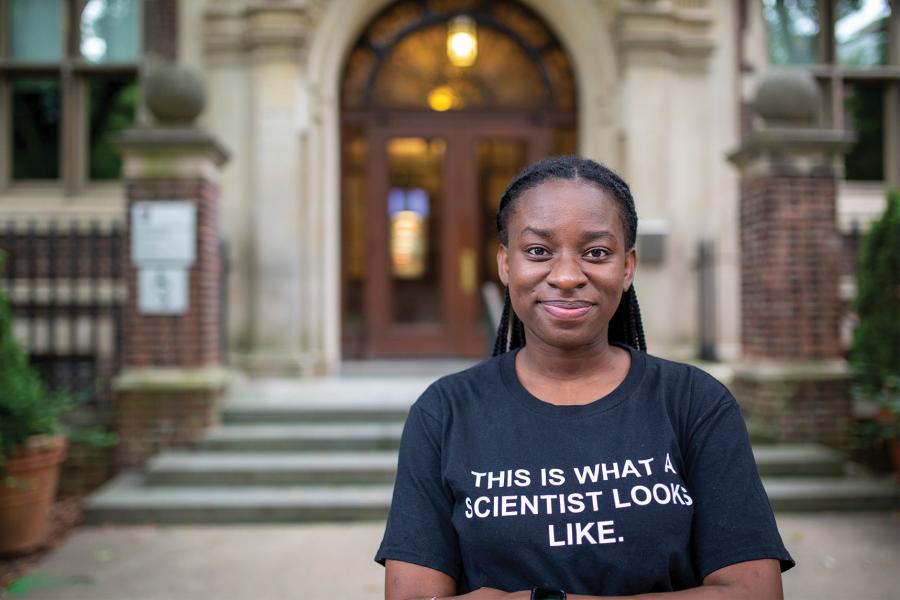 Lisa Adaramodu wearing a shirt smiling at the camera