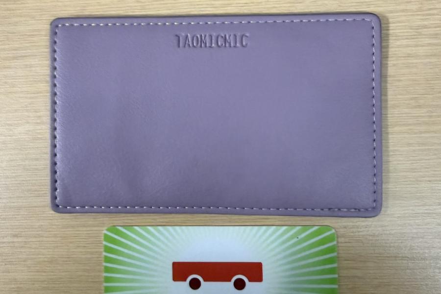 Purple wallet and a peggo card