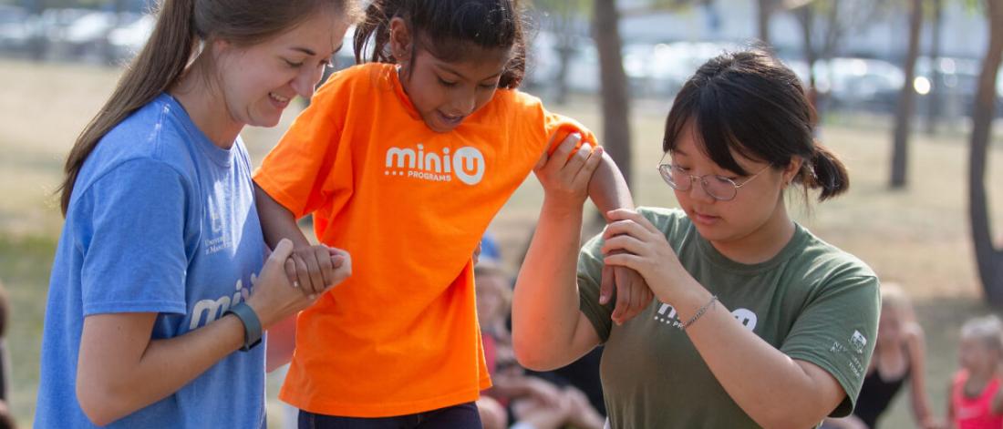 Three Mini U kids from the Leadership Development program