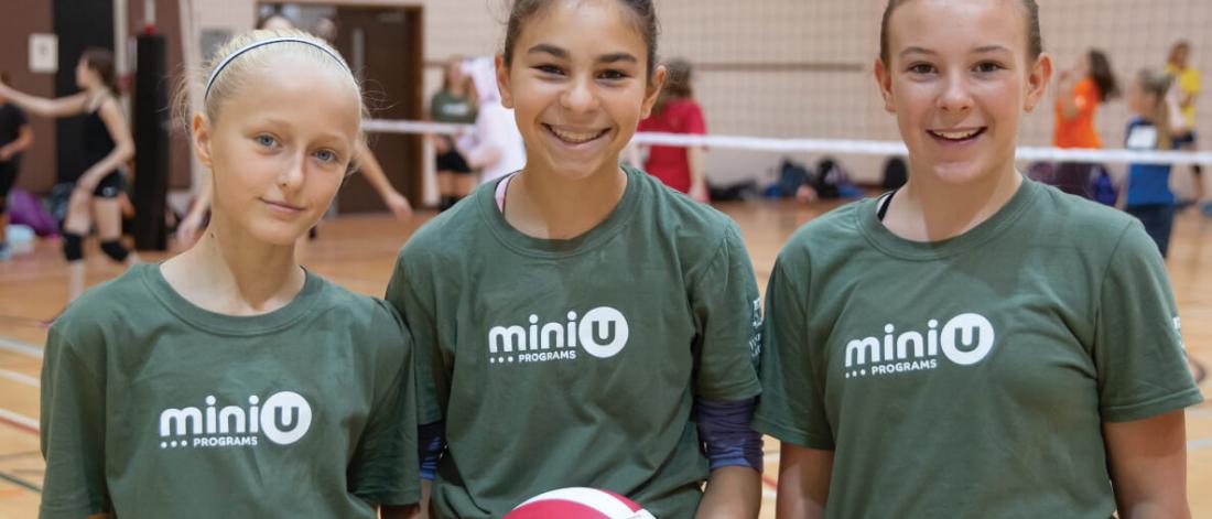 Three girls from the Mini U Senior Program during volleyball