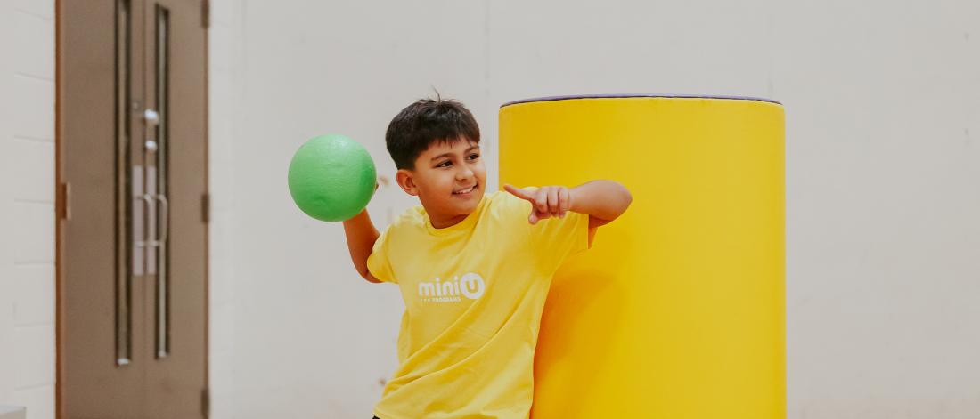 Child throwing a dodgeball