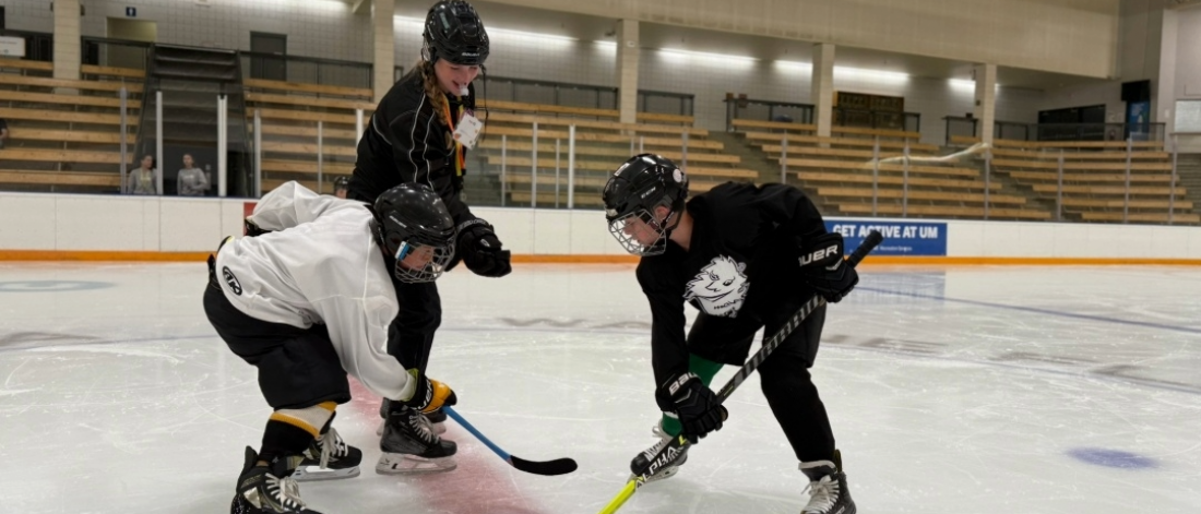 participants waiting for a hockey faceoff