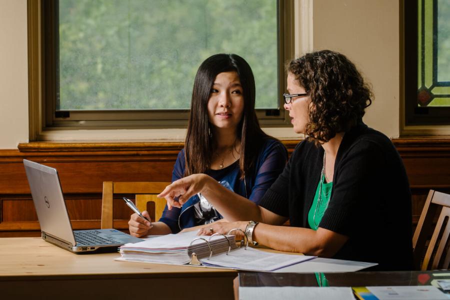 two women at a desk working