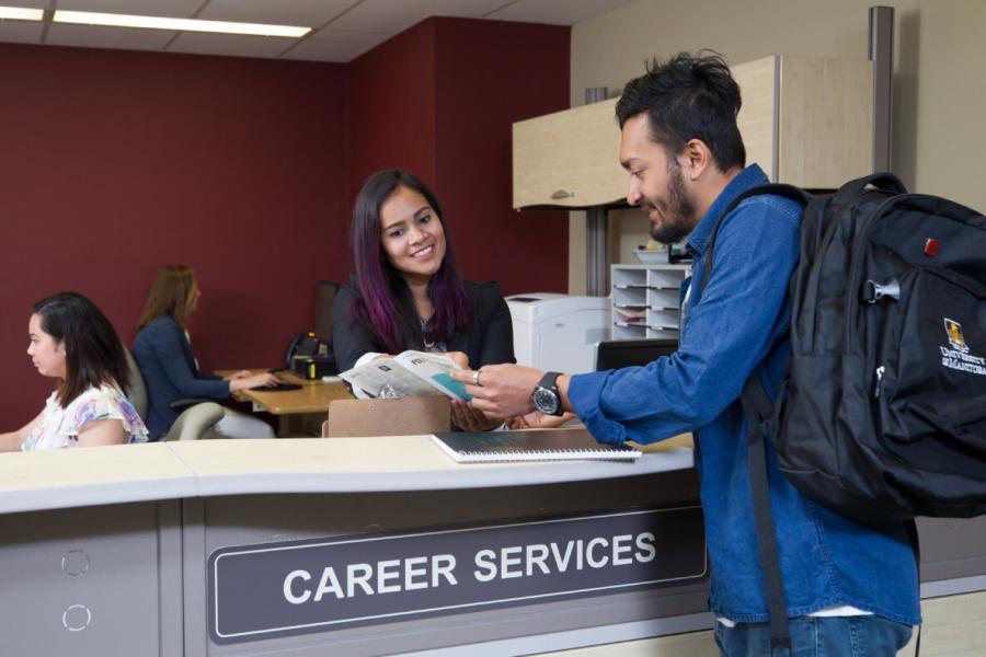 student at career service office getting support