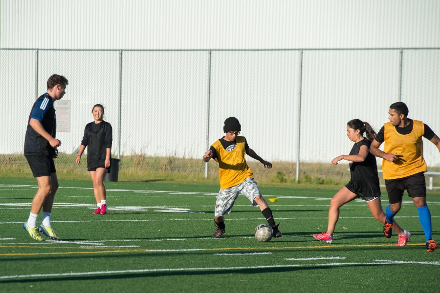 students playing recreational soccer