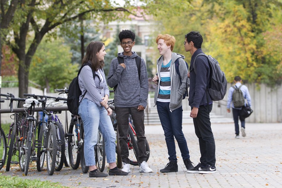 group of students talking outdoors