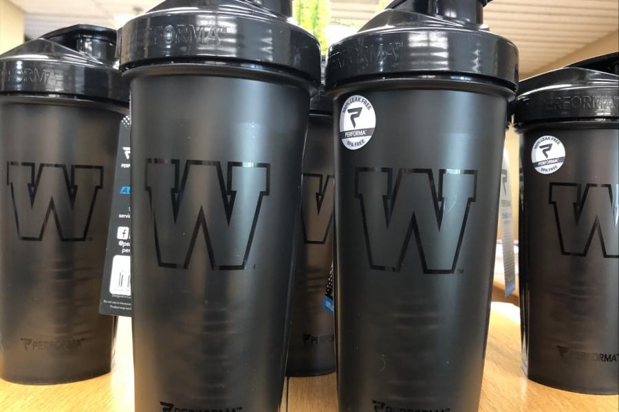 A collection of shaker cups with Winnipeg Blue Bombers logos.