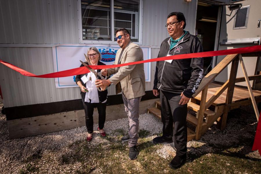 CATHERINE COOK, VICE PRESIDENT, INDIGENOUS, KARL ZADNICK, CEO OF THE INTERLAKE REGION TRIBAL COUNCIL AND CHIEF KURVIS ANDERSON CUT RIBBON TO OPEN LEARNING HUB AT PINAYMOOTANG FIRST NATION IN AUGUST.