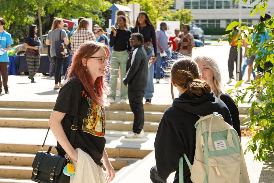 Students chatting in the welcome to the herd event