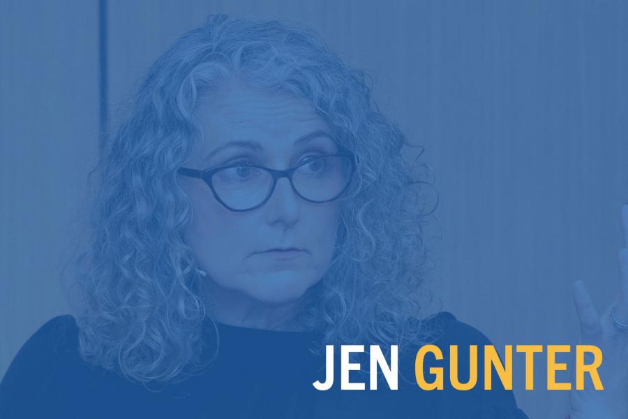 Decorative image showing blue overlay with text overtop an image of Dr. Jen Gunter speaking to an audience. The text reads: Jen Gunter.