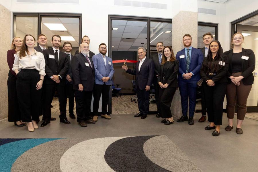 L. Kerry Vickar surrounded by University of Manitoba Law students at the opening of the L. Kerry Vickar Business Law Clinic.