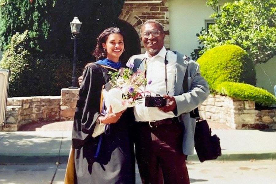 Delia Douglas and her father at her PhD graduation.