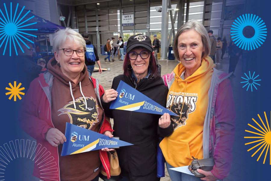 3 UM alums celebrating at the Homecoming football game