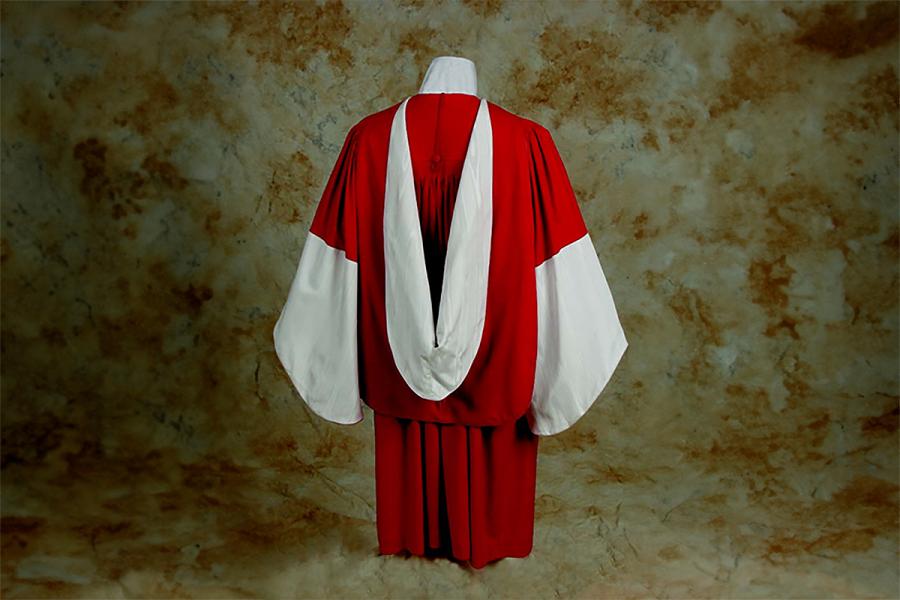 A scarlet red gown with a trim of white watered silk with a white hood lining.