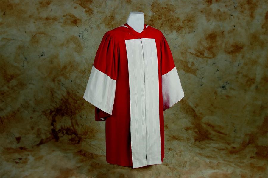 A scarlet red gown with a trim of white watered silk.