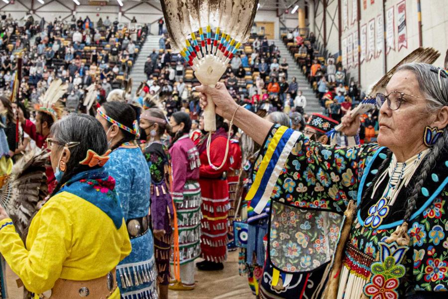 Indigenous members of the University of Manitoba community in Pow Wow regalia at the 2022 traditional Graduation Pow Wow.