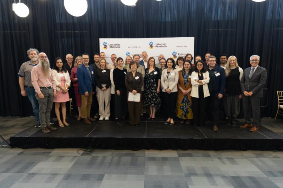 group of faculty being honoured at awards reception