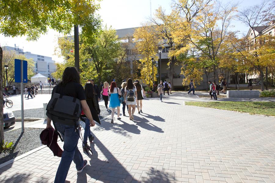 students walking on campus in fall.