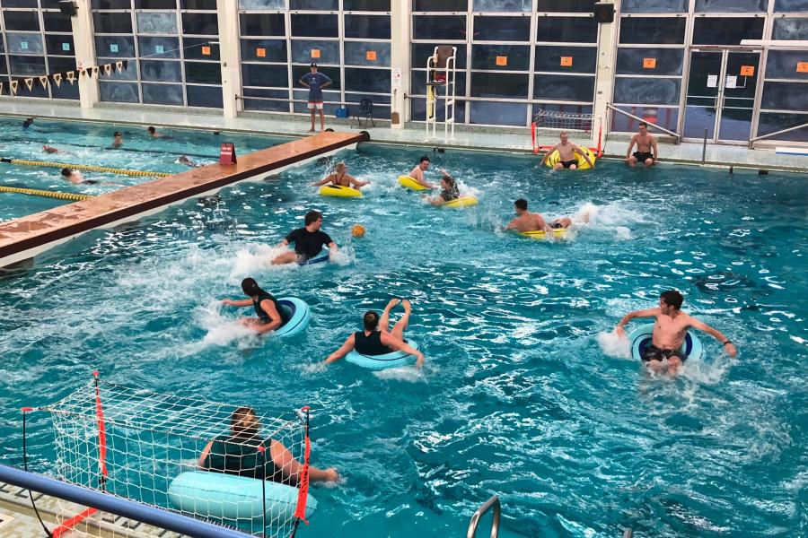 a game of waterpolo being played in the Joyce Fromson Pool