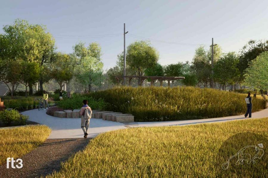 A person entering the Garden for Well-being on a path that has limestone seating inset into a mound planted with grasses and shrubs.