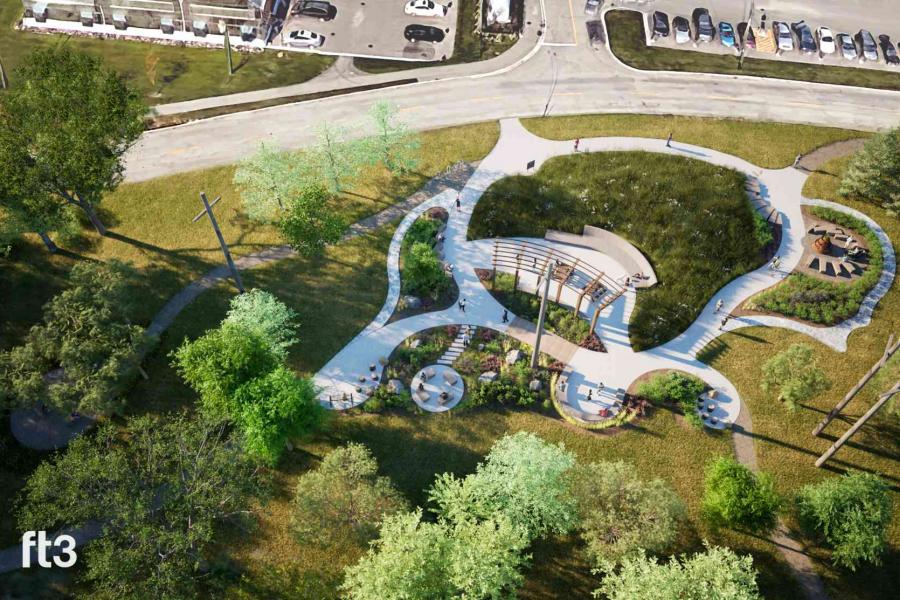 An overall view of the Garden for Well-being showing the paths, shade structure, seating and plantings.