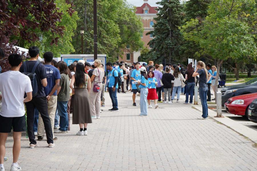 Students gathered on campus during orientation events.