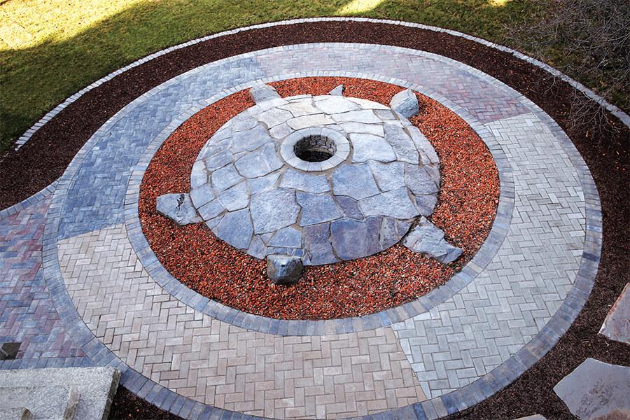 Rocks in the shape of a turtle for a fire in front of the NCTR building.